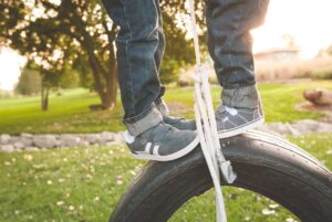 family portraits - boys on tire swing